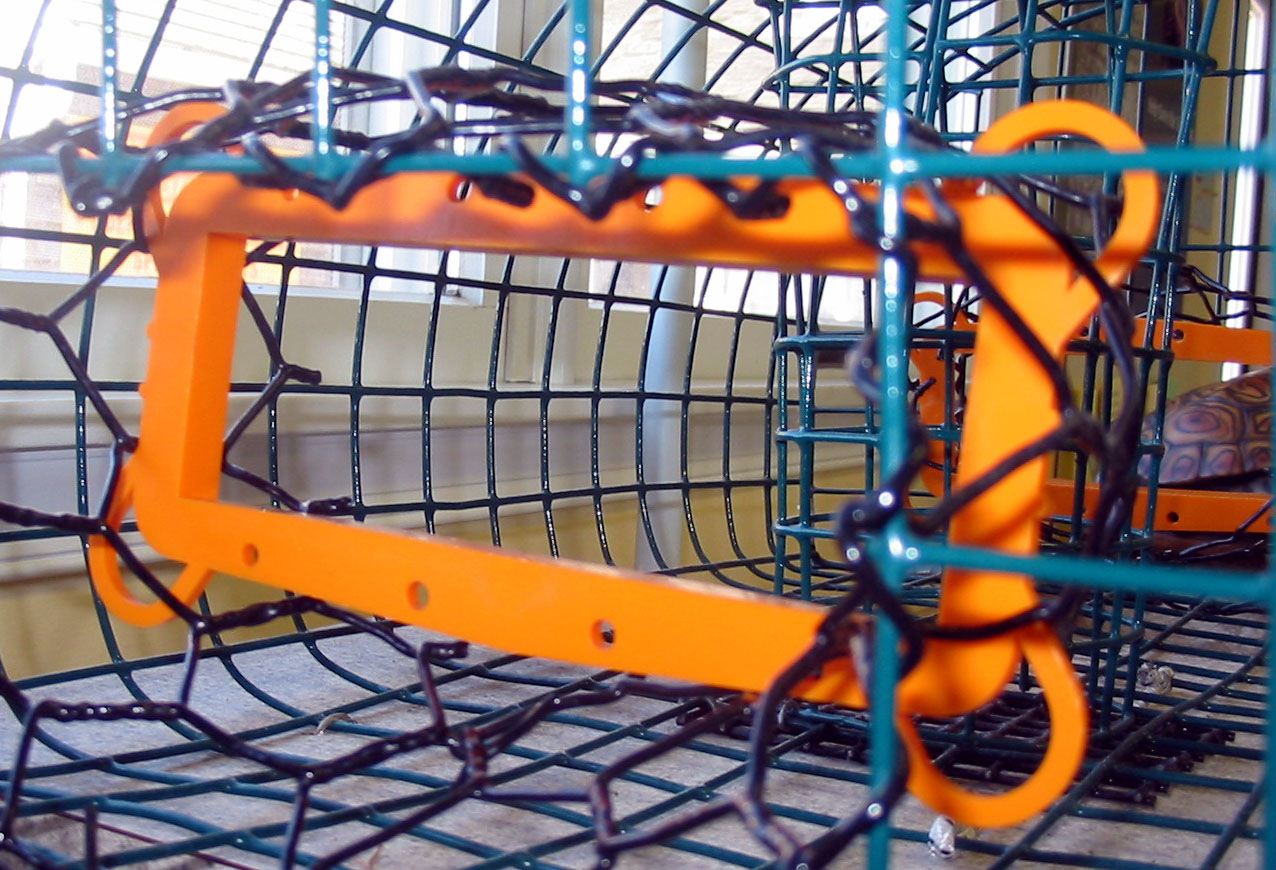 Excluder devices on commercial crab traps